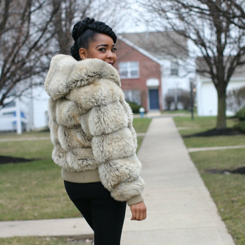 Faux Fur jacket. Very warm for the winter, looks and feels real